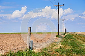 Power lines cross the rural landscape in central Colorado.