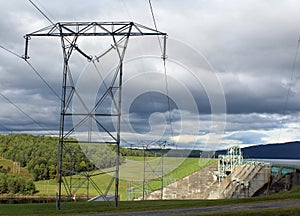 Power lines with a Dam in the background