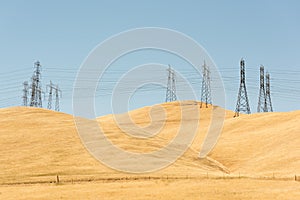 Power Lines On Golden Hills