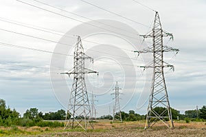 Power lines passing through huge distances to transmit electricity to the end user. Support of an overhead power line