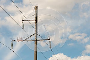 Power lines passing through huge distances to transmit electricity to the end user. Support of an overhead power line