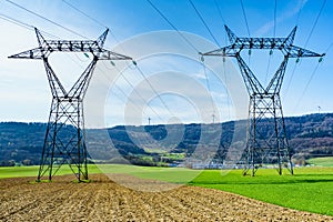 Power lines voltage towers photo