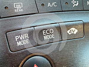 Power mode, Eco mode and Ev driving mode buttons in hybrid car