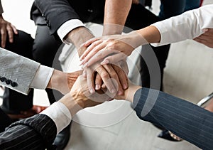 Power of the new generation, Team work, Join forces to achieve the goal. Business people, managers, employees shaking hands,