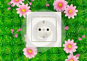 Power outlet on the green grass