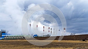 Hot steam from lignite-fired power plant chimneys