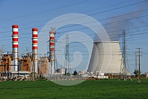 Power plant, cooling towers emitting steam