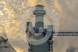 Power Plant with smoke emitted from smokestacks