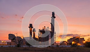 Power plant on sunset sky