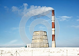 Power plant in winter sunny day