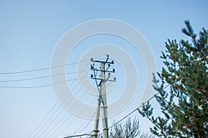 Power pole on blue sky background