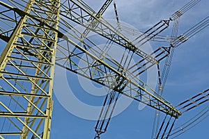 Power pole with insulators and high-voltage cable