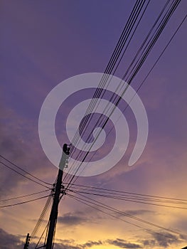 Power poles and beautiful sky light of sunset