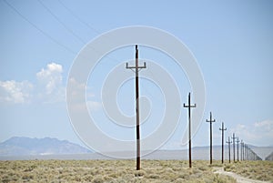 Power poles receding to infinity photo