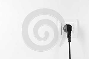 Power socket and plug on white background.