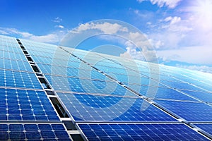 Power solar panel on blue sky background,alternative clean green energy concept