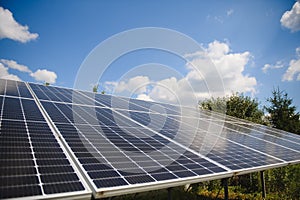 power solar panel on blue sky background,alternative clean green energy concept