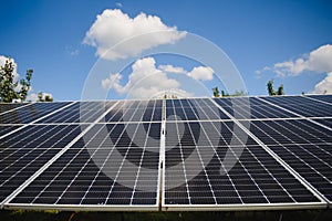 power solar panel on blue sky background,alternative clean green energy concept