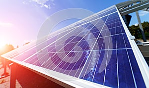 power solar panel on blue sky background,alternative clean green energy concept