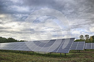 Power solar panel on blue sky background,alternative clean green energy. HDR photo