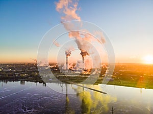 Power station with smoking chimney