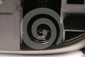 Power supply compartment for a wireless computer mouse. Extrem close-up