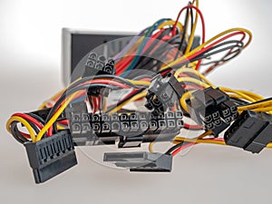 Power supply for a computer with connectors and cables for connecting the motherboard, CPU, video card