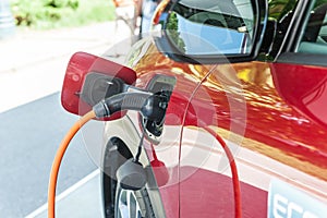 Power supply for electric car charging and red car