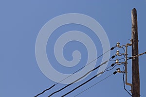 power supply line in front of blue sky