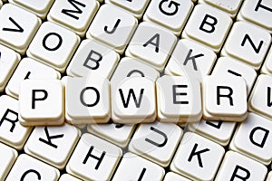 Power text word crossword title caption label cover background. Alphabet letter toy blocks. White alphabetical letters.
