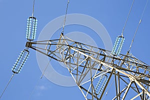 Power tower and transmission lines on blue background