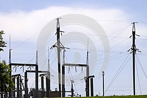 Power transformer in high voltage switchyard in modern electrical substation.