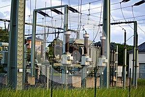 Power transformer in high voltage switchyard in modern electrical substation in Hesse, Germany