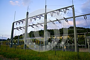 Power transformer in high voltage switchyard in modern electrical substation in Hesse, Germany