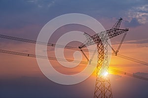 Power transmission pylon in sunset