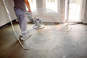 Power trowel with engine, machine for finishing, leveling concrete surface photo