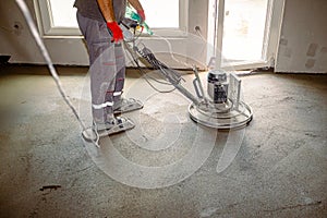 Power trowel with engine, machine for finishing, leveling concrete surface photo