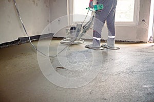 Power trowel with engine, machine for finishing, leveling concrete surface photo