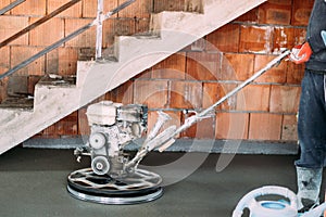 Power trowel tool. Construction Industry details. Helicopter concrete floor finishing on construction site