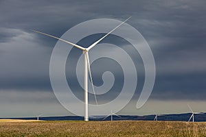 Power of wind turbine generating electricity clean energy with cloud background on the sky.Global ecology