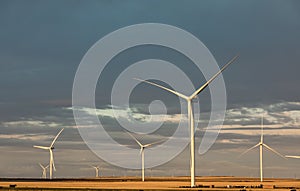 Power of wind turbine generating electricity clean energy with cloud background on the sky.Global ecology
