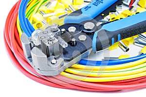 Power wires with cable stripper and cord end terminals on a white background