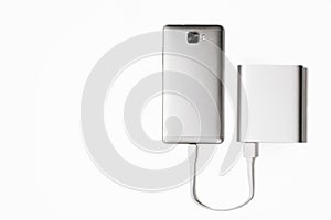 Powerbank charge smartphone isolated white
