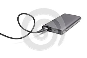 Powerbank new, powerful dark color with two usb inputs on a white background