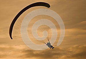 Powered parachute at sunset