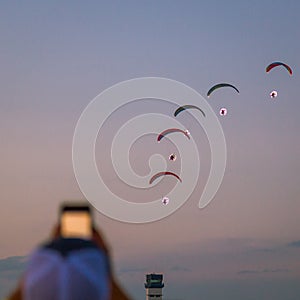 Powered paragliders performing night airshow at Sun`n`Fun 2018