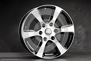 powerful alloy wheels for an SUV on a dark background