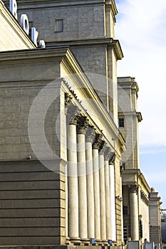 Powerful columns with capitals and pigeons, architecture