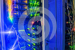 Powerful computer servers. Racks with network equipment are on the technical platform of the Internet provider. Server room is the