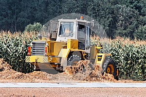 Powerful crawler bulldozer close-up at the construction site. Construction equipment for moving large volumes of soil. Modern